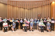 The Acting Chief Executive, Mr John Lee (front row, third left); the Secretary for Labour and Welfare, Dr Law Chi-kwong (front row, first left); the Under Secretary for Labour and Welfare, Mr Ho Kai-ming (back row, first left), and a number of Principal Officials and Under Secretaries today (October 20) appealed to the public to receive seasonal influenza vaccination early to get prepared for the coming winter influenza season.