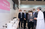 The Chief Executive, Mrs Carrie Lam, visited the Kai Tak Holding Centre today (March 30). Photo shows Mrs Lam (third right) being briefed by the Associate Vice-President (Chinese Medicine Development) of Hong Kong Baptist University (HKBU), Professor Bian Zhaoxiang (first right), on the facilities of the centre. Looking on are the Secretary for Labour and Welfare, Dr Law Chi-kwong (second left); the Secretary for Food and Health, Professor Sophia Chan (third left); the President and Vice-Chancellor of HKBU, Professor Alexander Wai (first left); and the Chief Executive Officer of Haven of Hope Christian Service, Dr Lam Ching-choi (second right).