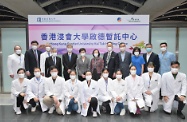 The Chief Executive, Mrs Carrie Lam, visited the Kai Tak Holding Centre today (March 30). Photo shows (from fifth left, back row) the Secretary for Labour and Welfare, Dr Law Chi-kwong; Mrs Lam; the Secretary for Food and Health, Professor Sophia Chan; and representatives from the care services providers, Haven of Hope Christian Service and the Hong Kong Baptist University, at the centre.