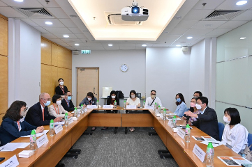 The Secretary for Labour and Welfare, Mr Chris Sun, today (August 12) inspected the Children's Residential Home of the Hong Kong Society for the Protection of Children (HKSPC) to take a closer look at the progress of its revamp project and the conditions of children under residential care. Photo shows Mr Sun (second right), accompanied by the Permanent Secretary for Labour and Welfare, Ms Alice Lau (third right), meeting with the Chairman of the Executive Committee of the HKSPC, Mr Robin Hammond (second left), and staff on the implementation progress of improvement measures.