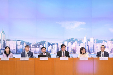The Deputy Financial Secretary, Mr Michael Wong (centre), holds a press conference on the Government's measures on importation of labour with the Secretary for Transport and Logistics, Mr Lam Sai-hung (second left); the Secretary for Development, Ms Bernadette Linn (third right); the Secretary for Labour and Welfare, Mr Chris Sun (third left); the Permanent Secretary for Transport and Logistics, Ms Mable Chan (first left); the Permanent Secretary for Development (Works), Mr Ricky Lau (second right); and the Deputy Commissioner for Labour (Labour Administration), Mr Raymond Ho (first right), at the Central Government Offices, Tamar, this afternoon (June 13).