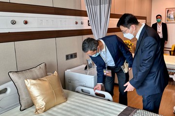The Secretary for Labour and Welfare, Mr Chris Sun, leading a delegation of the Labour and Welfare Bureau, today (August 30) started his visit to three Mainland cities in the Guangdong-Hong Kong-Macao Greater Bay Area, together with a delegation of the Legislative Council Panel on Welfare Services. Photo shows Mr Sun (right) taking a closer look at a residential care place for the elderly in the Clifford Care Center while in Guangzhou this afternoon.