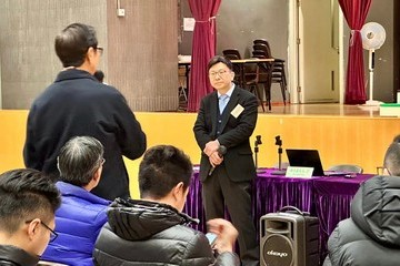The Secretary for Labour and Welfare, Mr Chris Sun, attended a briefing session on social welfare services for Tuen Mun District Council (DC) this afternoon (January 25) to meet and exchange views with new DC members. Photo shows Mr Sun (standing, right) listening to a DC member