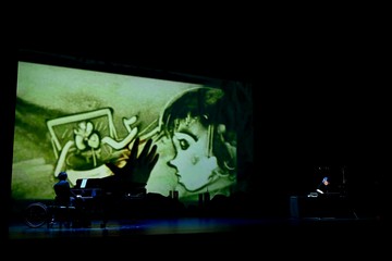 The Secretary for Labour and Welfare, Mr Chris Sun, officiated at the opening ceremony of the Diversity and Inclusion Arts Festival 2026 today (March 20). Photo shows two artists with disabilities giving a multimedia performance using sand art and a piano.
