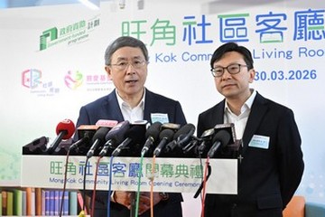 The Acting Chief Secretary for Administration, Mr Cheuk Wing-hing (left), responds to media questions after the Mong Kok Community Living Room Opening Ceremony today (March 30). Next to Mr Cheuk is the Secretary for Labour and Welfare, Mr Chris Sun.