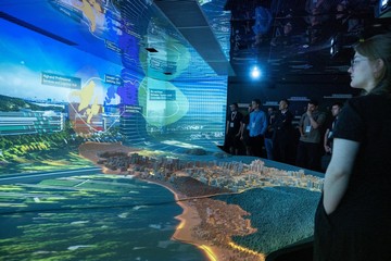 Hong Kong Talent Engage arranged a delegation of global innovation and technology (I&T) talent to visit Hong Kong, Qianhai in Shenzhen, and Nansha in Guangzhou from September 7 to 11 to learn about the I&T ecosystem, industry support and opportunities in the three places. Photo shows the delegation learning about the development plans for the Northern Metropolis at the Hung Shui Kiu/Ha Tsuen New Development Area Community Liaison Centre.