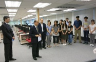 The Secretary for Labour and Welfare, Mr Matthew Cheung Kin-chung (second left), visited the Working Family Allowance Office. He exchanged views with staff of the Office and listened to their briefing on the preparation progress of the Low-income Working Family Allowance Scheme. Mr Cheung thanked the staff for their dedication and encouraged them to keep up their good work so that the Scheme could be launched as soon as possible. Accompanying Mr Cheung was the Head of the Working Family and Student Financial Assistance Agency, Mr Esmond Lee (first left).