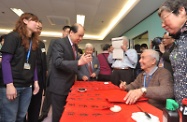 Mr Cheung is pleased to see the elderly centre users participating in both traditional and digital-age activities.