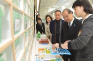 The Secretary for Labour and Welfare, Mr Matthew Cheung Kin-chung, paid a visit to Wong Tai Sin District and toured a social services complex cum elderly home this afternoon. Picture shows Mr Cheung (second right), accompanied by the Chairman of Sik Sik Yuen, Dr Chan Tung (third right), visiting the pharmacy of Ho Yam Care and Attention Home for the Elderly to learn about its daily operation.