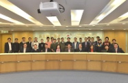 Mr Cheung met the Chairman of the Wong Tai Sin District Council (WTSDC), Mr Li Tak-hong, and some members of the WTSDC to listen to their views on local affairs and various matters. Photo shows Mr Cheung (first row, fourth right); Mr Li (first row, centre); and the District Officer (Wong Tai Sin), Mrs Angel Choi (first row, sixth right), in a group picture with members of the WTSDC.