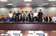 The Secretary for Labour and Welfare, Dr Law Chi-kwong, went to the Eastern District Council (EDC) to exchange views with members on labour and welfare issues as well as matters of local concern. Photo shows Dr Law (front row, sixth left) and the Under Secretary for Labour and Welfare, Mr Caspar Tsui (front row, fifth left), with the Chairman of the EDC, Mr Wong Kin-pan (front row, fourth left), and other members.