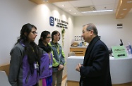 The Secretary for Labour and Welfare, Mr Matthew Cheung Kin-chung (first right), visits the Labour Department's Tung Chung Job Centre. Picture shows Mr Cheung chatting with participants of the Employment Services Ambassador Programme for Ethinic Minorities to understand their employment needs.