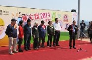 The Secretary for Labour and Welfare, Mr Matthew Cheung Kin-chung (eighth left), encourages both employers and employees to attach importance to occupational safety and health while speaking at the opening ceremony of a charity walk organised by The Hong Kong Federation of Trade Unions Occupational Safety and Health Association. On the third left is the Commissioner for Labour, Mr Donald Tong.