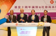 Mr Cheung (second right); the Chairman of the CIIF Committee, Mr Yeung Ka-sing (second left); the Vice-chairman of the CIIF Committee, Professor Joe Leung (first right); and the Chairman of the Promotion and Development Sub-Committee of the CIIF, Mr Lai Chi-tong (first left), officiate at the opening ceremony.