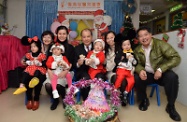 The Secretary for Labour and Welfare, Mr Matthew Cheung Kin-chung, visited the Children's Residential Home of the Hong Kong Society for the Protection of Children (HKSPC). Photograph shows Mr Cheung (centre) with the Director of the HKSPC, Ms Susan So (second right); Service Director of the HKSPC Mr Mak Kang-ying (first right); the Superintendent of the Children's Residential Home, Ms Shirley Chui (second left); and Chief Social Work Officer of the Social Welfare Department Ms Ip Siu-ming (first left) with four children.