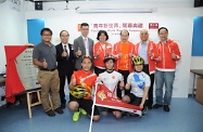 Mr Cheung (third right, back row) is pictured with other officiating guests and young participants of Adversity Challengers.