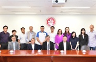 The Secretary for Labour and Welfare, Dr Law Chi-kwong, visited the Islands District Council (IDC). Photo shows Dr Law (front row, second right) and the Under Secretary for Labour and Welfare (USLW), Mr Caspar Tsui (front row, first right), accompanied by the Chairman of the IDC, Mr Chow Yuk-tong (front row, second left), and the District Officer (Islands), Mr Anthony Li (front row, first left), with members. Also attending were two secondary school students (back row, second and third right) enrolled in the "Be a Government Official for a Day" Programme 2019 - Heads of Departments Edition who were shadowing the USLW for one day.