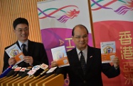 The Secretary for Labour and Welfare, Mr Matthew Cheung Kin-chung (right), announces the implementation details of the Low-income Working Family Allowance Scheme. On his left is the Head of the Working Family and Student Financial Assistance Agency, Mr Esmond Lee.