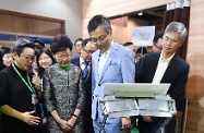 The Secretary for Labour and Welfare, Dr Law Chi-kwong; and the Chairman of the Elderly Commission, Dr Lam Ching-choi, accompanied the Chief Executive, Mrs Carrie Lam, to visit the Gerontech and Innovation Expo cum Summit 2018 at the Hong Kong Convention and Exhibition Centre, touring exhibition booths with products for elderly persons or persons with disabilities.