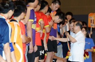 The Secretary for Labour and Welfare, Mr Matthew Cheung Kin-chung, presents prize to the winning teams of the 4th Hong Kong Games (HKG) Futsal Competition. HKG is one of the highlight events of the “Vibrant Hong Kong” theme under the “Hong Kong: Our Home” Campaign, showcasing the vitality of Hong Kong people.