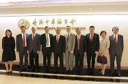 The Secretary for Labour and Welfare, Dr Law Chi-kwong, paid a courtesy visit to the Chinese General Chamber of Commerce (CGCC). Picture shows Dr Law Chi-kwong (fourth left) and the Commissioner for Labour, Mr Carlson Chan (fifth right) with the Chairman of CGCC, Dr Jonathan Choi (fifth left), Life Honorary Chairman of CGCC, Mr Ho Sai-chu (fourth right) and other representatives from CGCC.
