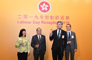 The Acting Chief Executive, Mr Matthew Cheung Kin-chung, and the Secretary for Labour and Welfare, Dr Law Chi-kwong, attended a Labour Day reception this evening hosted by the Labour Department. Photo shows (from left) the Permanent Secretary for Labour and Welfare, Ms Chang King-yiu; Mr Cheung; Dr Law; and the Commissioner for Labour, Mr Carlson Chan, at the toasting ceremony.