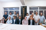 The Secretary for Labour and Welfare, Dr Law Chi-kwong, paid a courtesy visit to the Hong Kong and Kowloon Trades Union Council (TUC). Picture shows Dr Law Chi-kwong (front row, centre) and the Commissioner for Labour, Mr Carlson Chan (front row, first right) with the Chairman of TUC, Mr Lo Tai-chi (front row, second left), and other representatives from TUC.