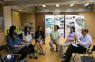 Mr Cheung (first right) chats with another former hidden youth (first left). On the second left is the social worker of the Hong Kong Christian Service.