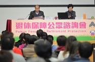 The Secretary for Labour and Welfare, Mr Matthew Cheung Kin-chung (left), accompanies the Chief Secretary for Administration and Chairperson of the Commission on Poverty, Mrs Carrie Lam (right), to attend a public forum on retirement protection at Yau Tong Community Hall to gauge the views of the public.