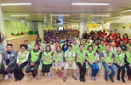 The Secretary for Labour and Welfare, Mr Stephen Sui (front row, centre) posed with the Chairman of Po Leung Kuk, Miss Abbie Chan (front row, sixth left); guests and volunteers.