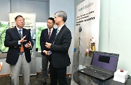 The Secretary for Labour and Welfare, Dr Law Chi-kwong, visited the Logistics and Supply Chain MultiTech R&D Centre (LSCM) to learn more about the application of technology in improving elderly services. Photo shows Dr Law (right) and the Under Secretary for Labour and Welfare, Mr Caspar Tsui (centre), being briefed by the Chief Executive Officer of the LSCM, Mr Simon Wong (left), on an infrared thermal sensing safety alert system for the elderly in a bathroom setting.
