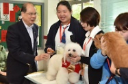 Mr Cheung (first left) tours the vocational taster classes.