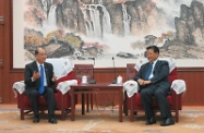 The Secretary for Labour and Welfare, Mr Matthew Cheung Kin-chung (left), meets with the Executive Vice President of the China Enterprise Confederation, Mr Huang Haisong, in Beijing to share with him Hong Kong's latest developments in the work of labour rights protection and fostering harmonious employer-employee relations.