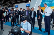 The Secretary for Labour and Welfare, Dr Law Chi-kwong, attended Hong Kong International Airport Career Expo 2018. Photo shows Dr Law (second right) touring the career expo.