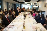 The Secretary for Labour and Welfare, Mr Matthew Cheung Kin-chung (fifth left), together with senior officials from the Labour and Welfare Bureau and Social Welfare Department, exchange views with the Chairman, Dr Ina Chan (fifth right), directors and other representatives of Tung Wah Group of Hospitals on welfare issues during a luncheon meeting.