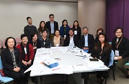 The Commission on Children today (November 30) held a stakeholders engagement session and launched a territory-wide "Caring for Our Kids" Campaign. Photo shows the Secretary for Labour and Welfare, Dr Law Chi-kwong (fourth right), with attendees at a breakout session.