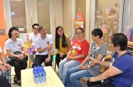 The Secretary for Labour and Welfare, Dr Law Chi-kwong, visited the Tung Wah Group of Hospitals Mr and Mrs Liu Lit Mo Child Development Centre at the Tin Ching Amenity and Community Building at Tin Ching Estate in Tin Shui Wai. Picture shows Dr Law (second left) and the Permanent Secretary for Labour and Welfare, Ms Chang King-yiu (first left), meeting with parents of service recipients.