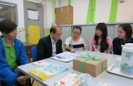 The Secretary for Labour and Welfare, Mr Matthew Cheung Kin-chung (second left), visits Christian Family Service Centre's Everjoy in Kwun Tong and chats with the centre's physiotherapist, occupational therapist, registered nurse and social worker to understand more about the home care service provided by non-governmental organisations to persons with severe disabilities.